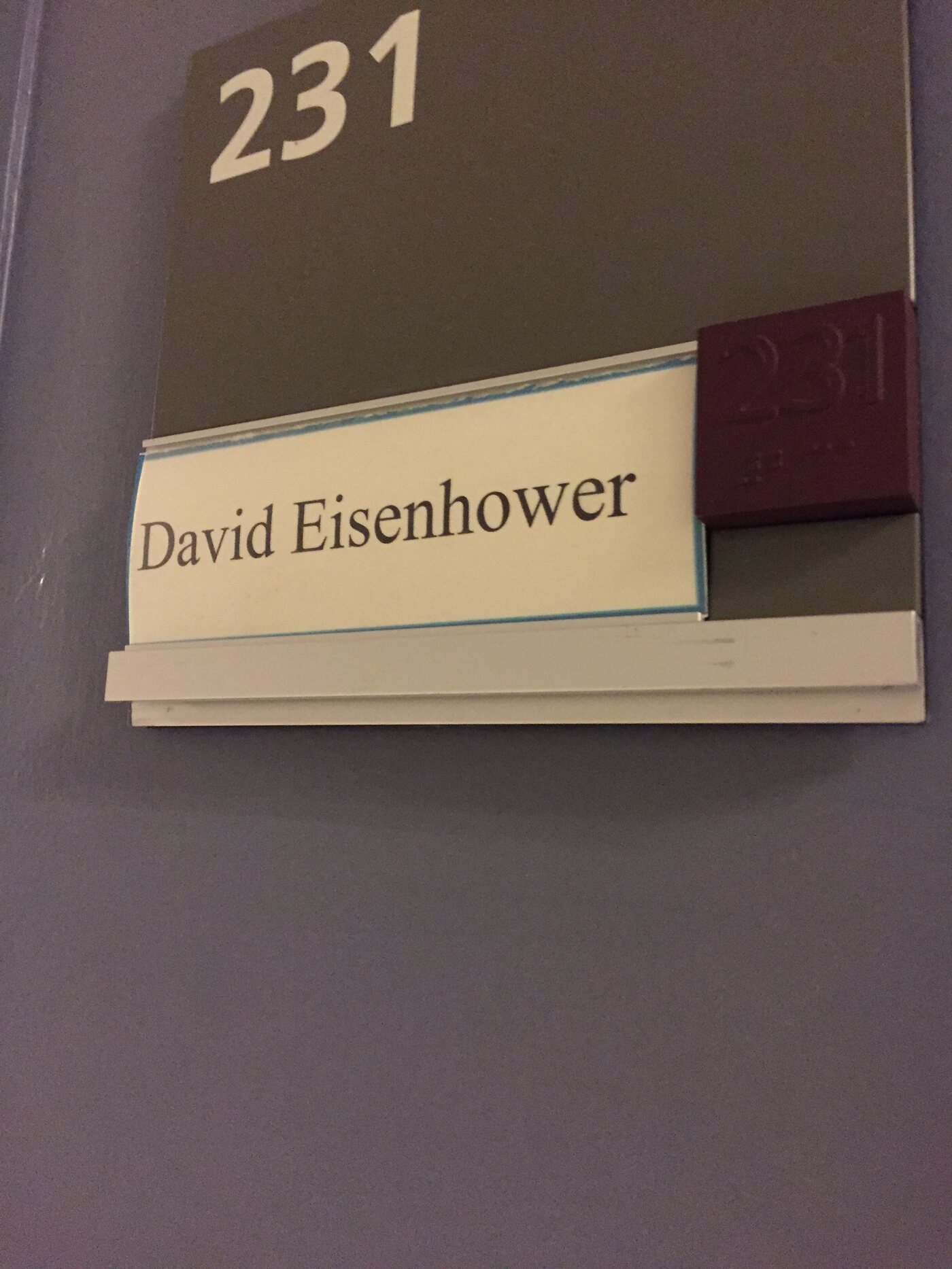 An office door plate reading 231, David Eisenhower